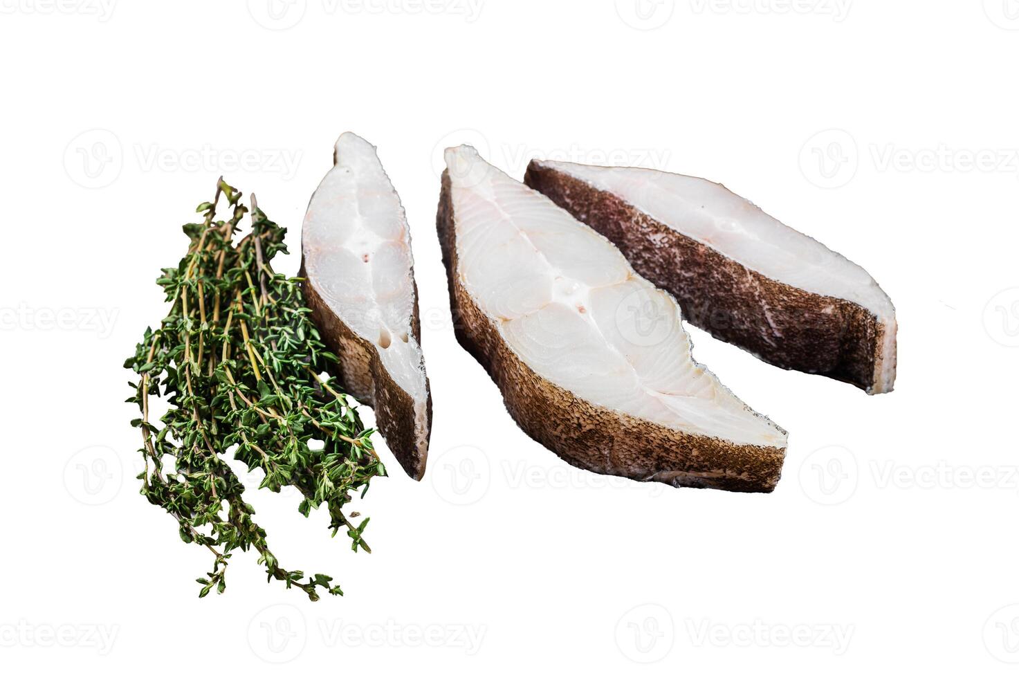 Atlantic halibut fish, raw steaks on wooden board with herbs. Isolated on white background. photo
