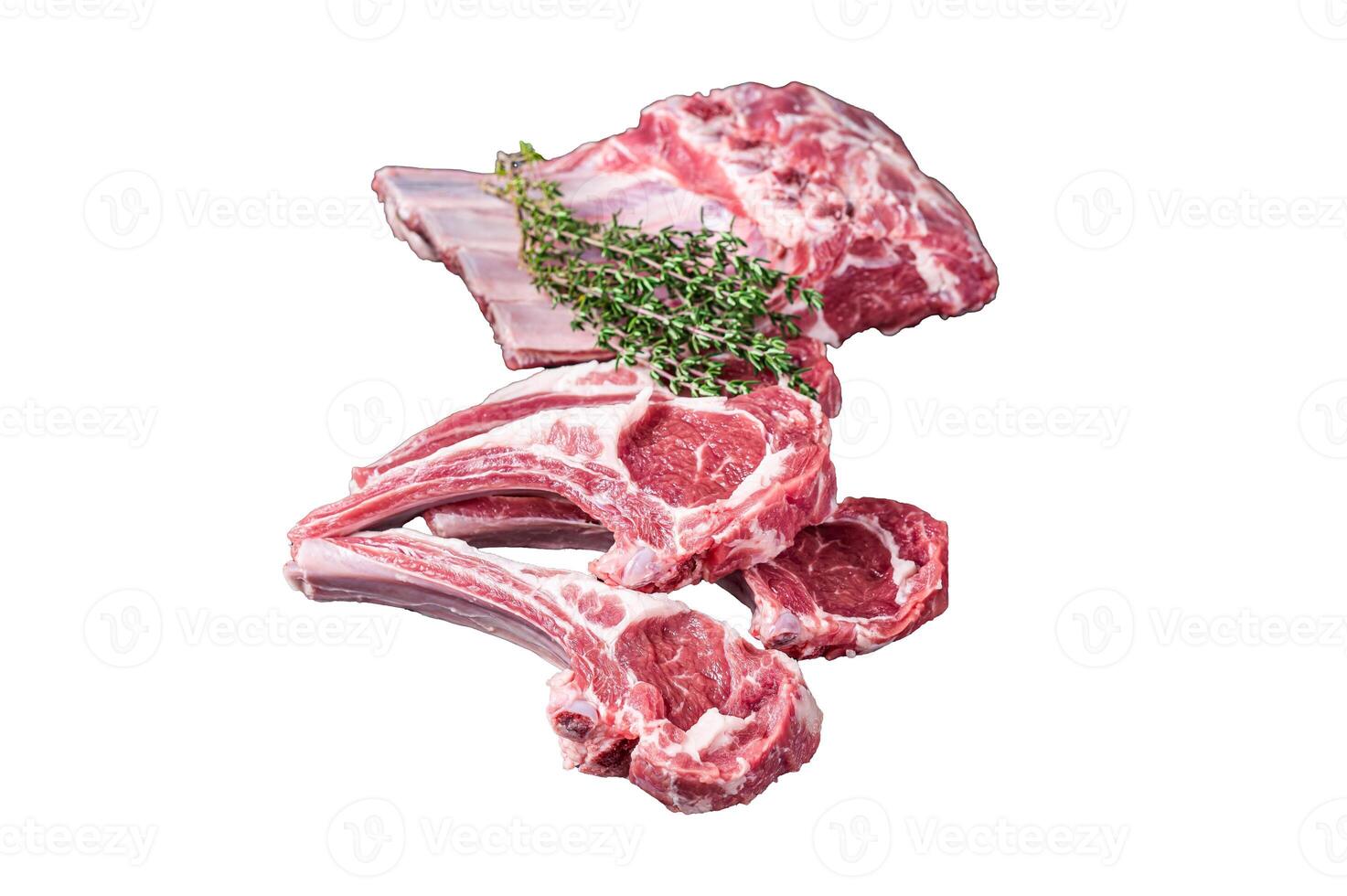 Fresh Raw lamb meat chop steaks on kitchen table with spices and herbs. Isolated, white background. photo