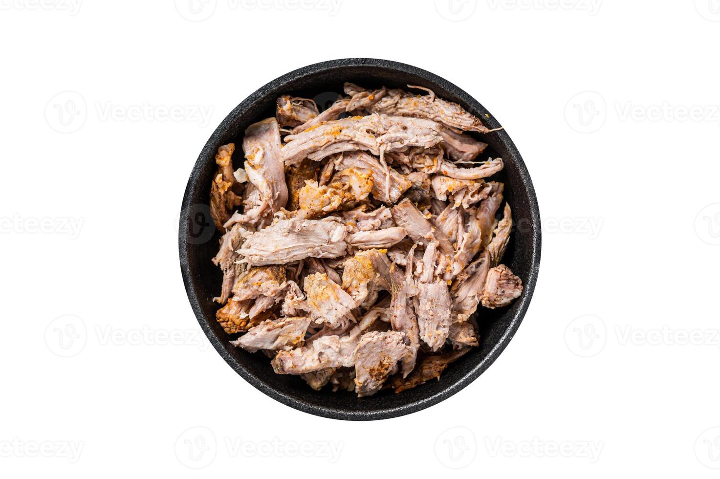 Slow shredded puilled pork meat in a pan with butcher knife. Isolated on white background. photo