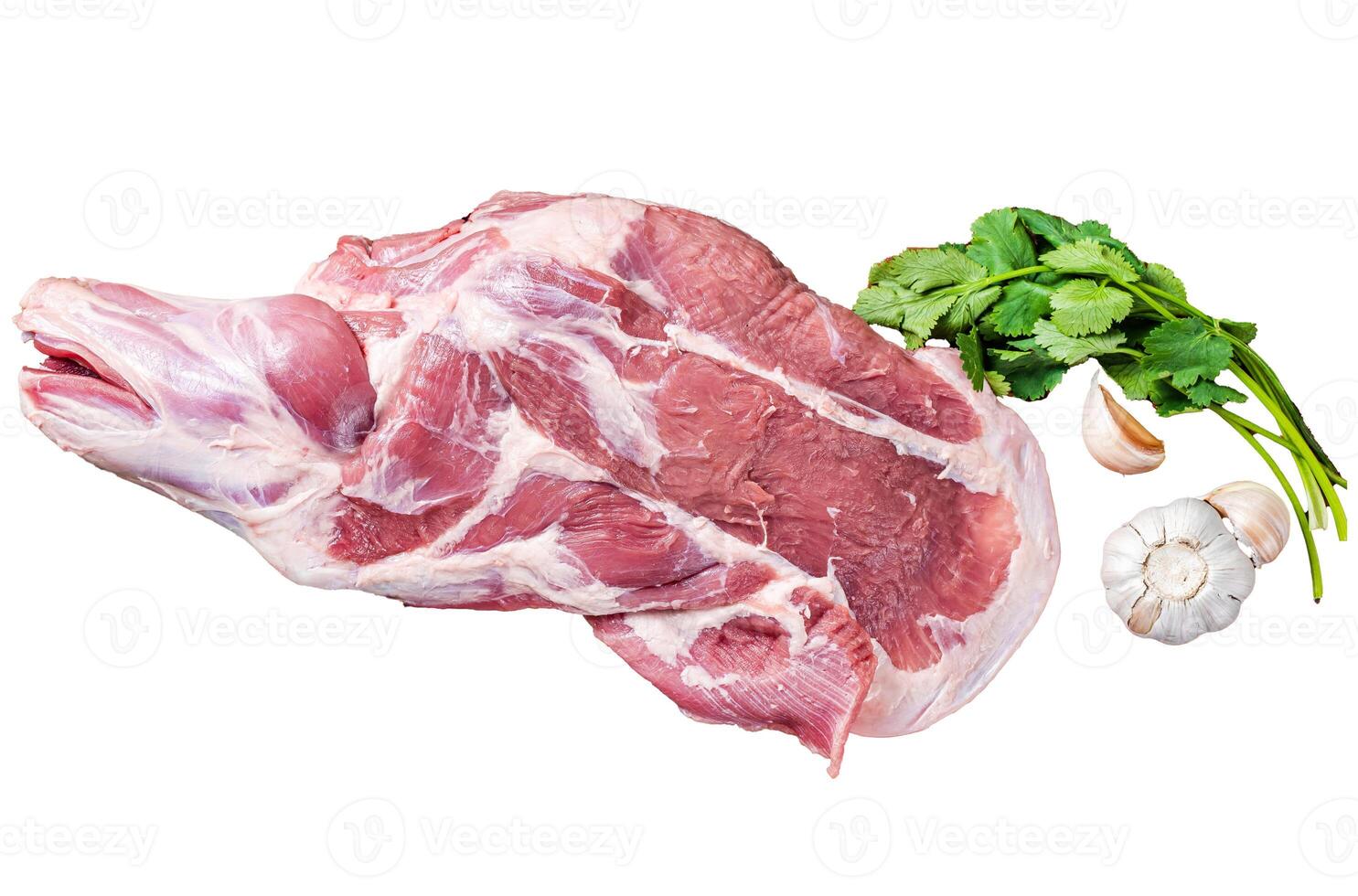Raw lamb whole shoulder, fresh leg meat on a wooden board with spices. Isolated, white background. photo