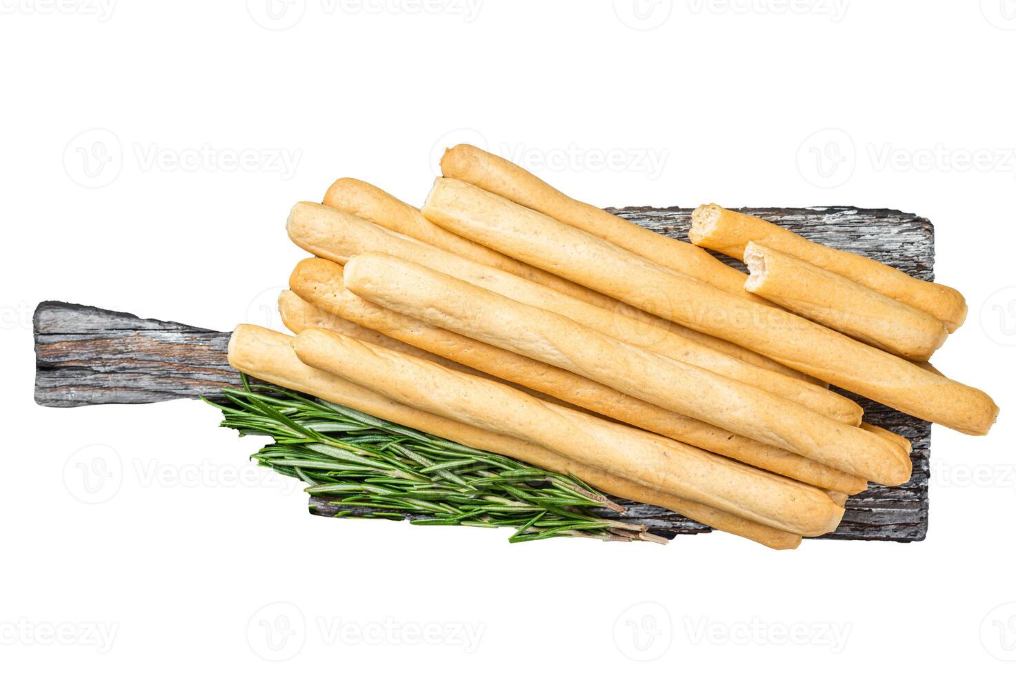 Italian grissini or salted bread sticks on wooden board. Isolated, white background. photo
