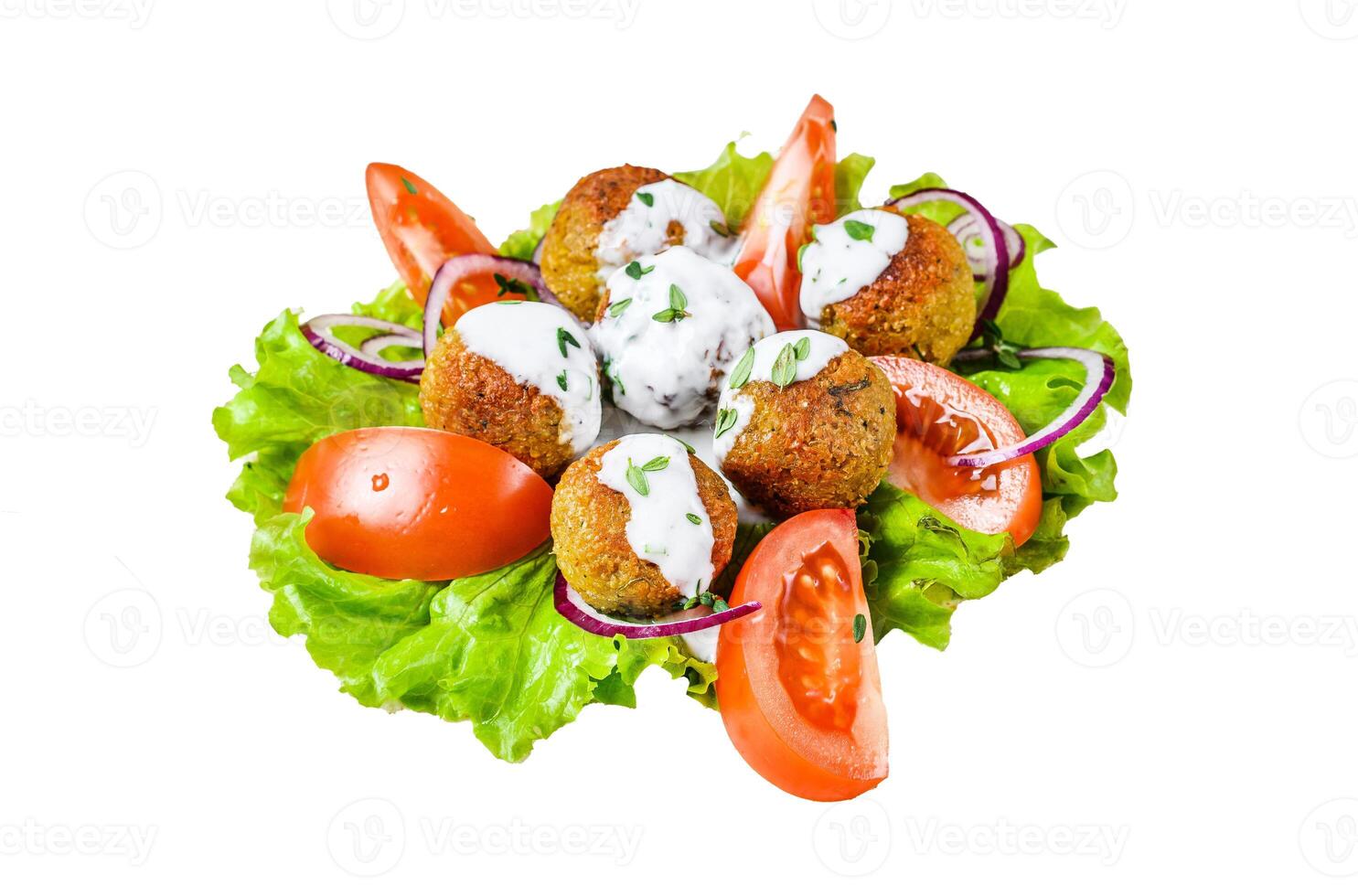 Vegetarian falafel with vegetables and tzatziki sauce on a tortilla bread. Isolated on white background, top view. photo