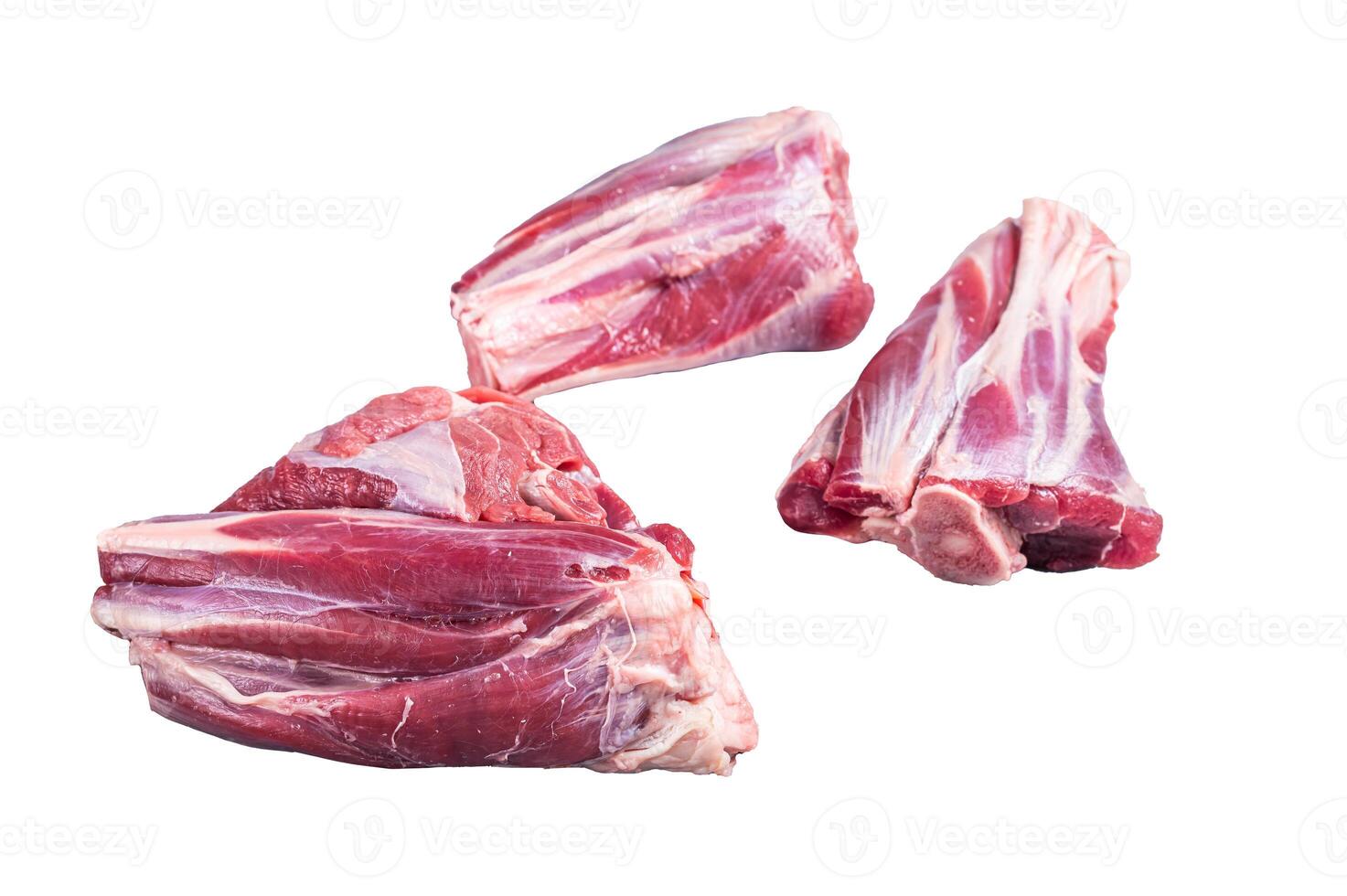 Uncooked Raw lamb shanks, mutton meat on kitchen table. Isolated on white background photo