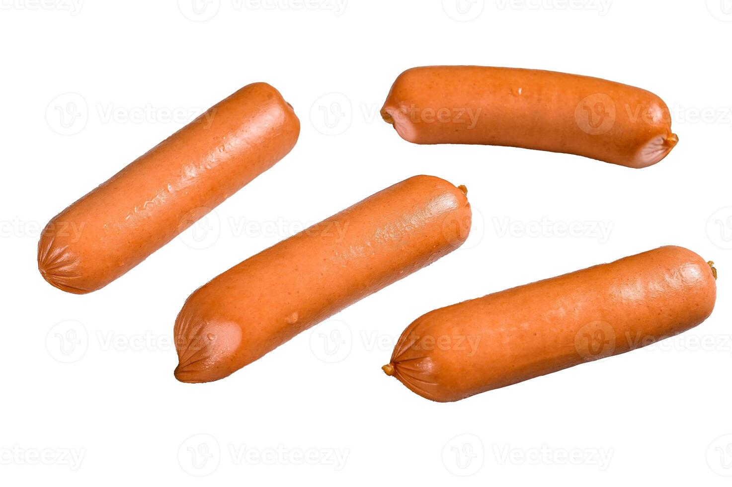 Raw barbecue sausages bratwurst on a table. Isolated on white background. photo