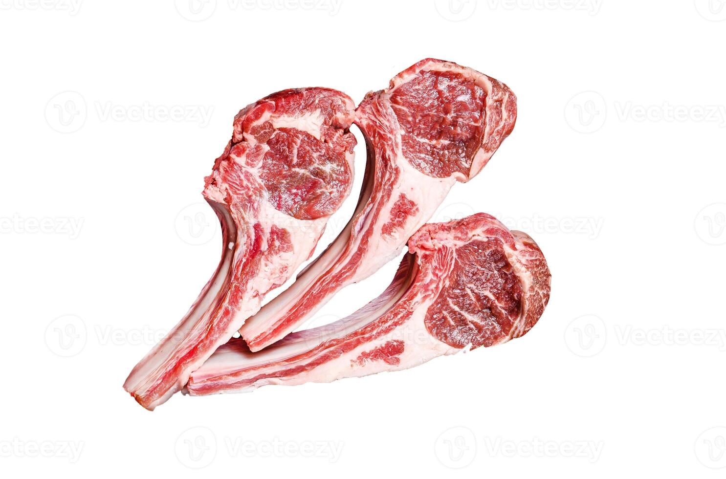 Raw lamb meat chops steaks in a wooden tray. Isolated on white background, top view. photo