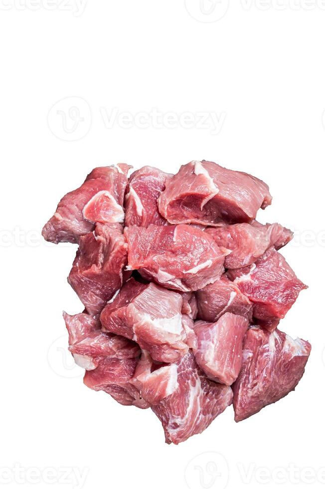 Fresh Raw Diced pork cubs meat with spices on a wooden butcher board. High quality Isolate, white background. photo