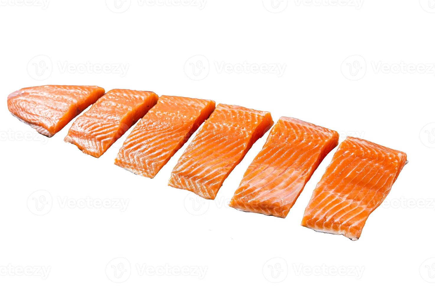 Sliced salmon fillet, raw fish meat with thyme and rosemary. Isolated on white background. photo