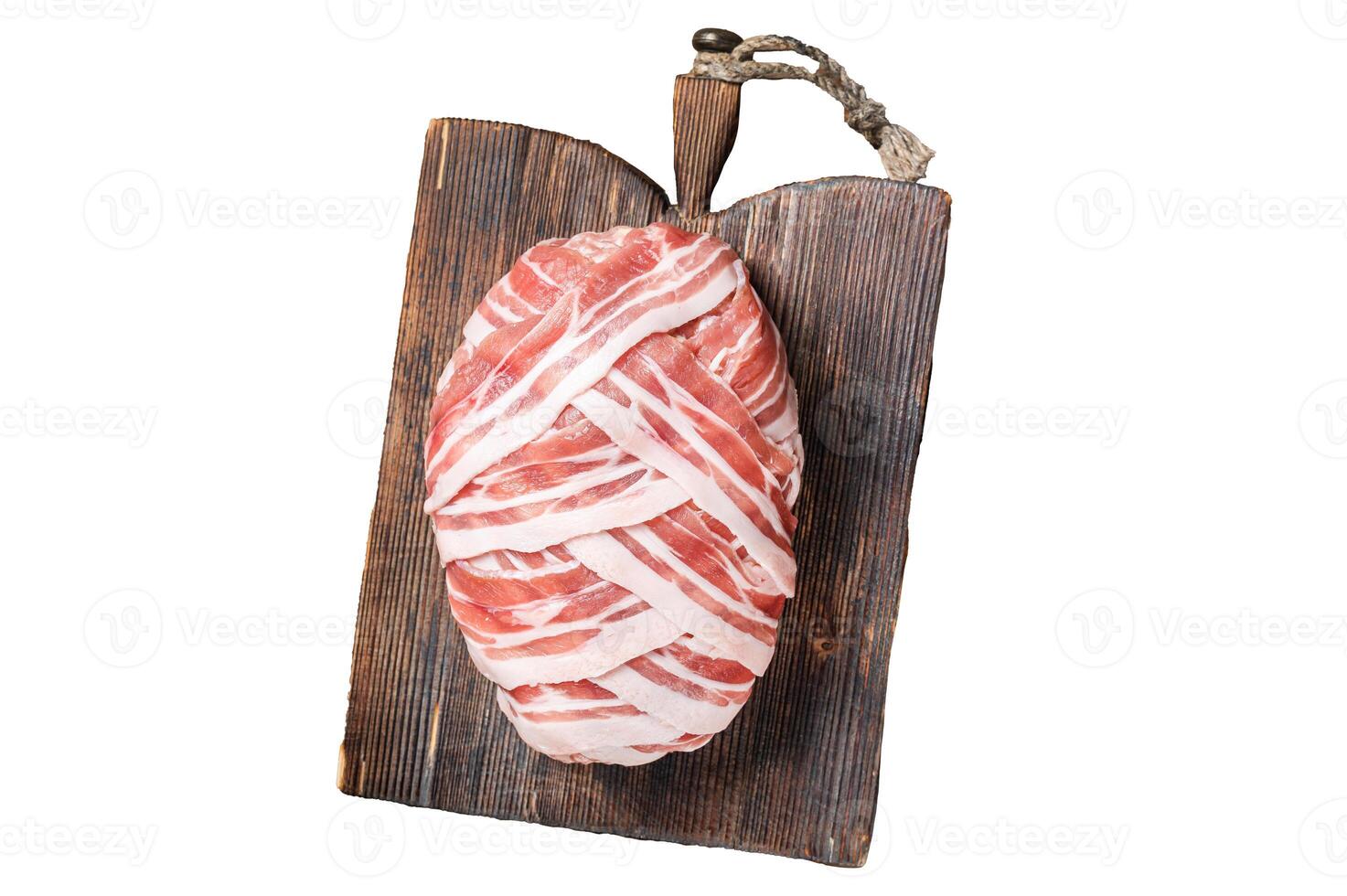 Raw meatloaf with ground meat and bacon with herbs and spices on wooden cutting board. Isolated, white background. photo