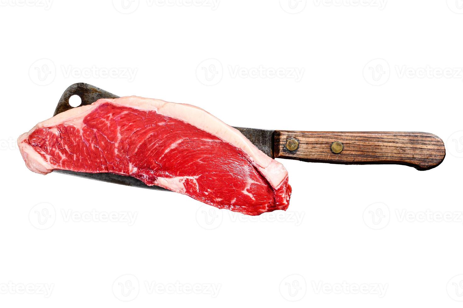 Raw sirloin steak on a cleaver. Marble beef. Isolated on white background. Top view. photo