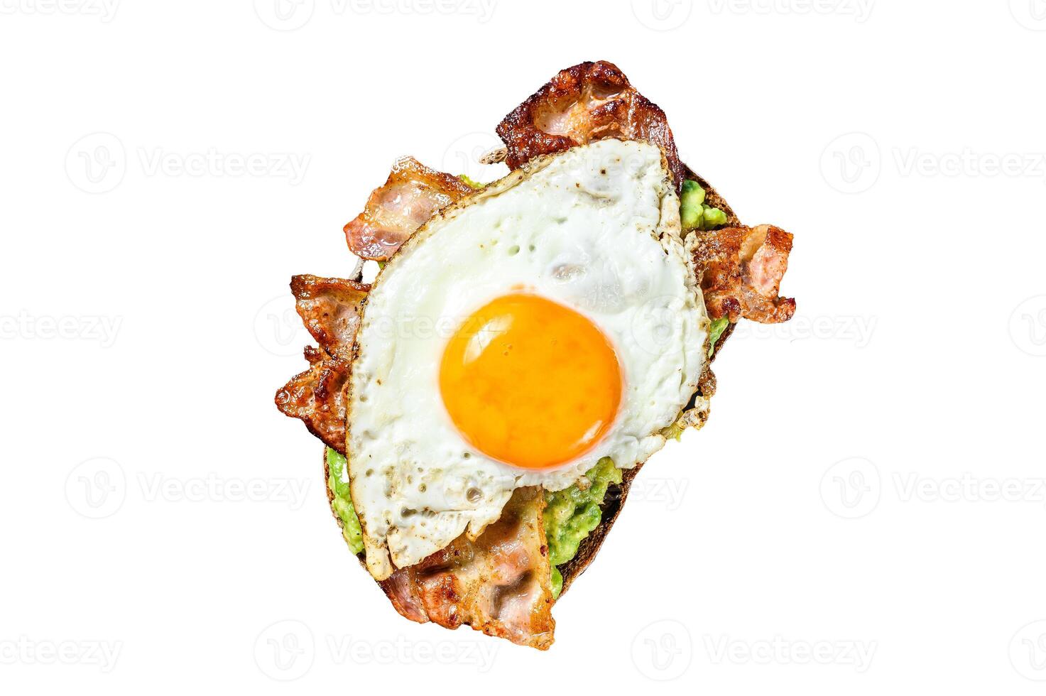 English breakfast, toast with bacon, avocado and egg on a cutting board. Healthy food. Isolated on white background. photo