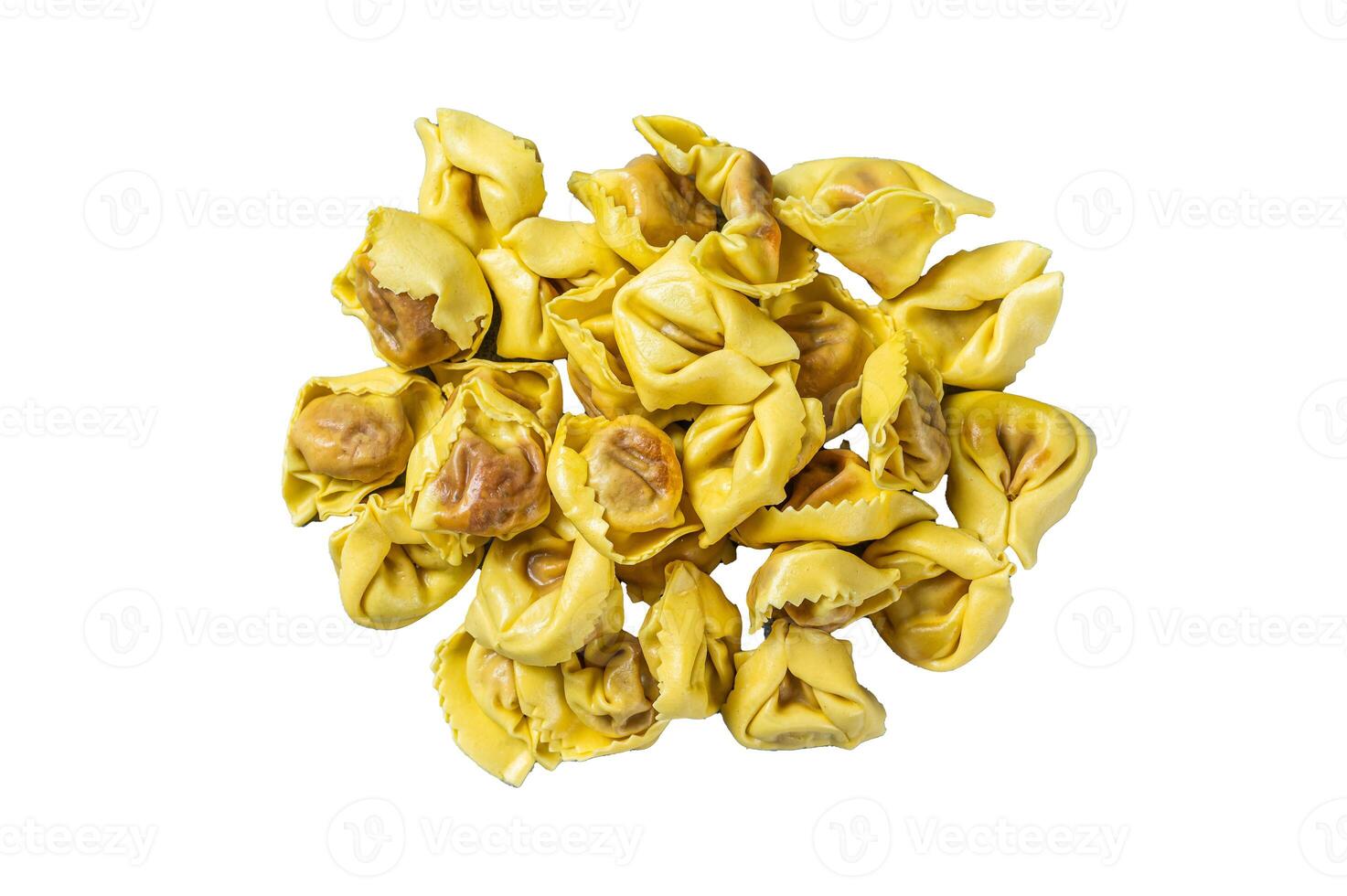 Uncooked raw ravioli with Mozzarella and Tomato. Isolated on white background, top view. photo