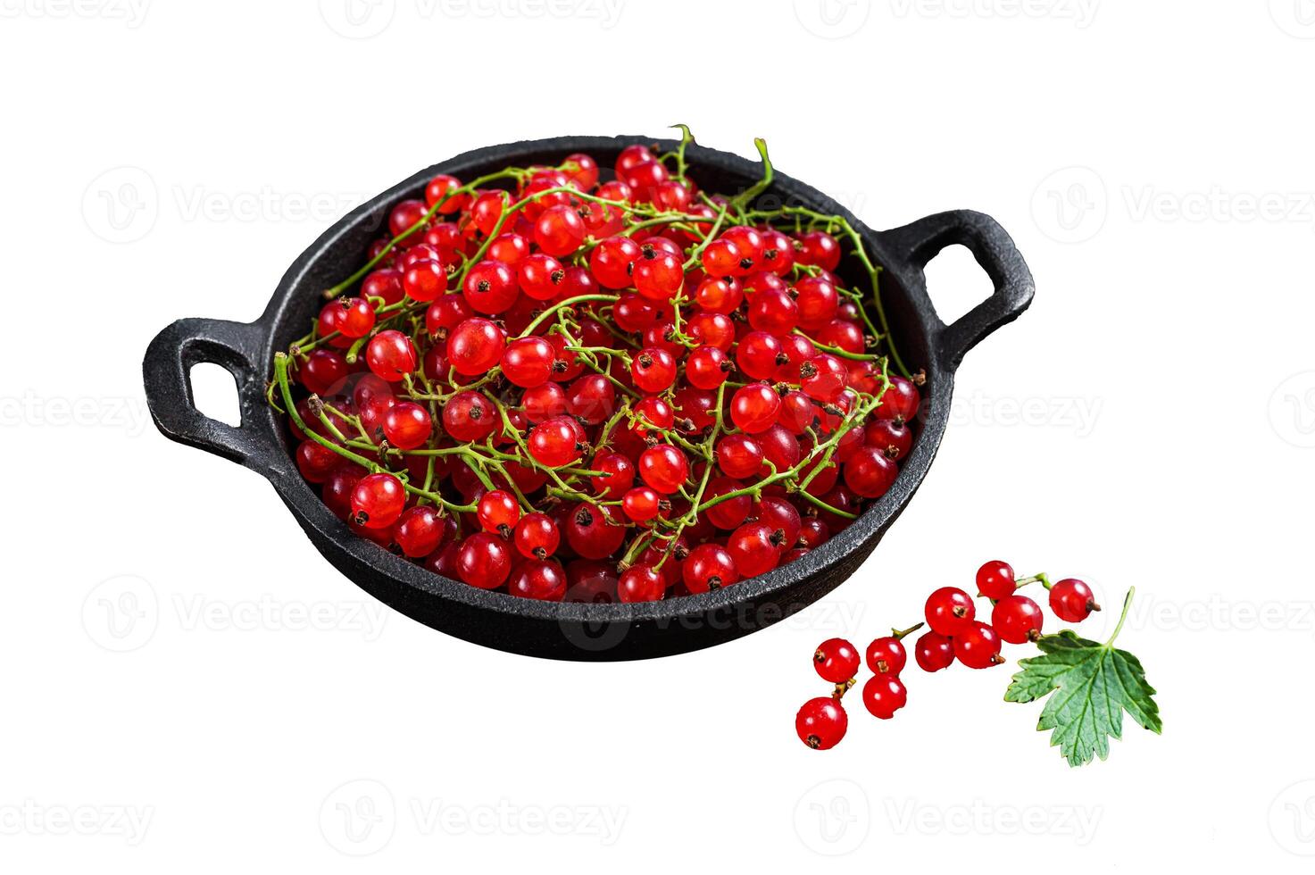 Red currant berries in a pan. Isolated on white background, top view. photo