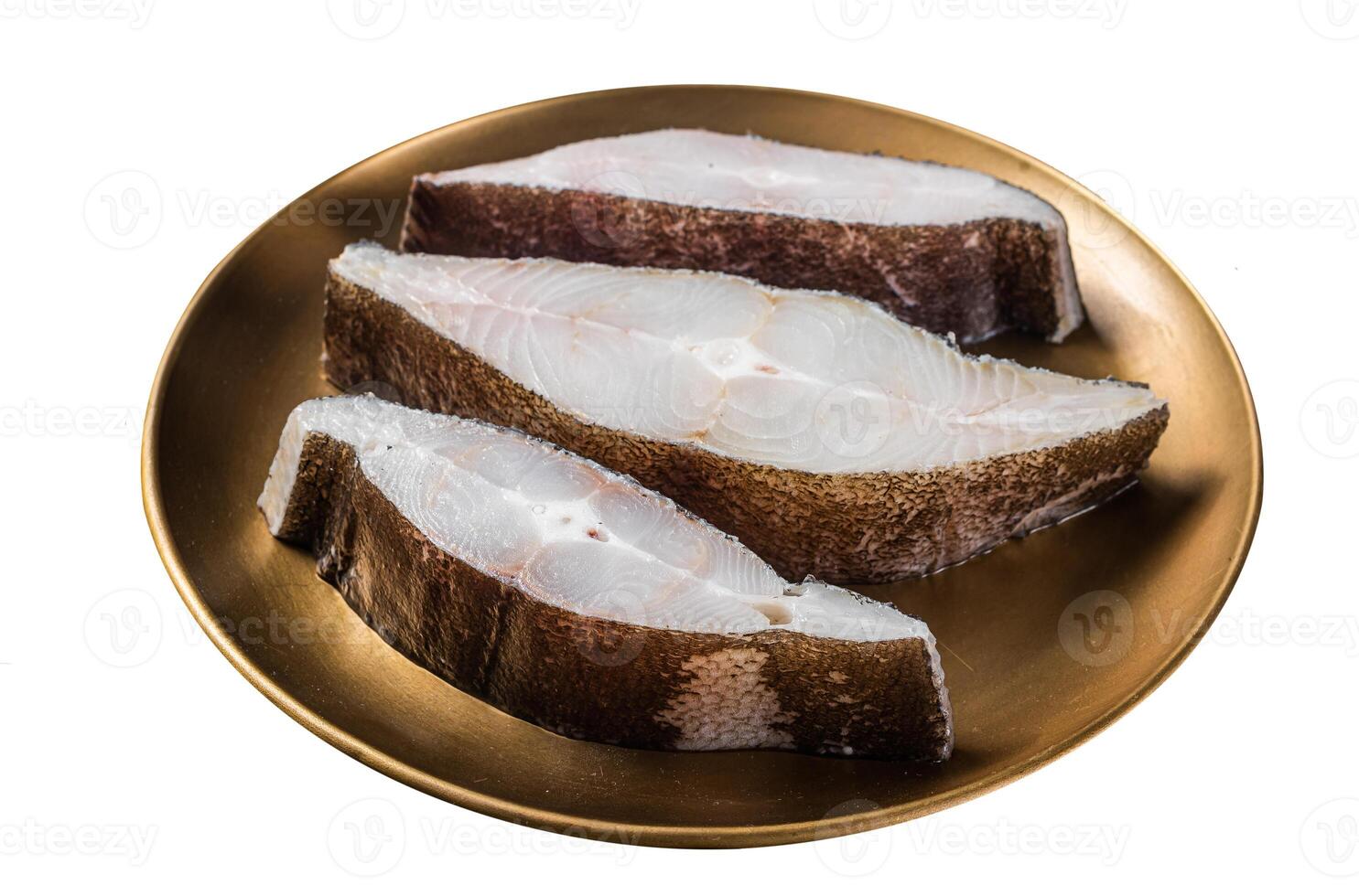 Sliced halibut fish, raw steaks on plate with thyme. Isolated on white background. Top view. photo