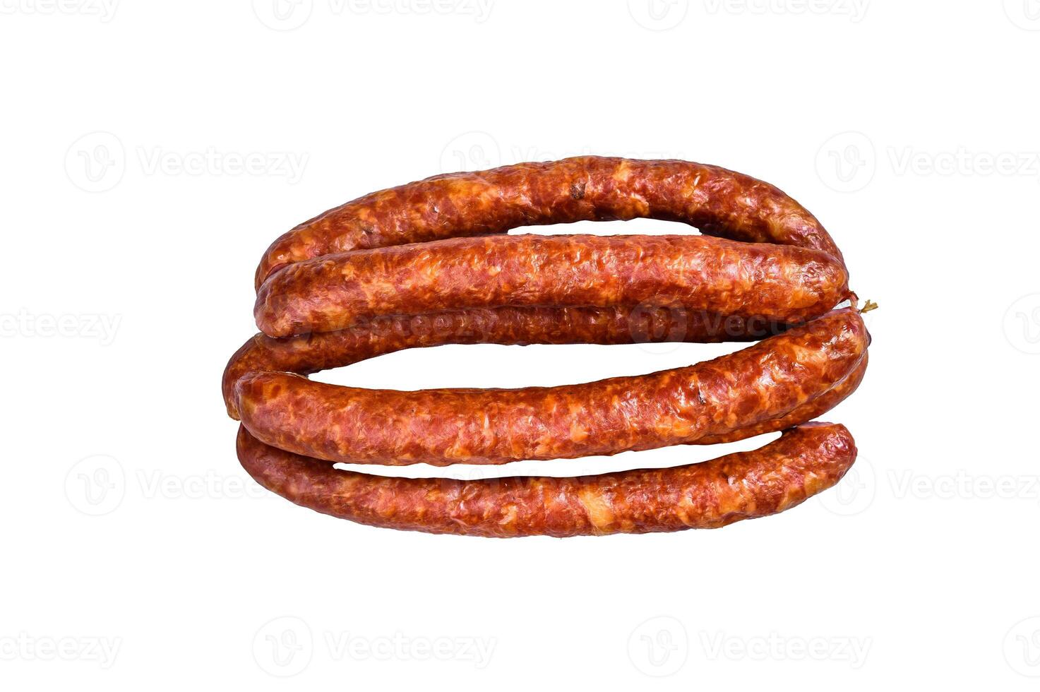 Hot Smoked sausages on a rustic table. Isolated on white background. photo