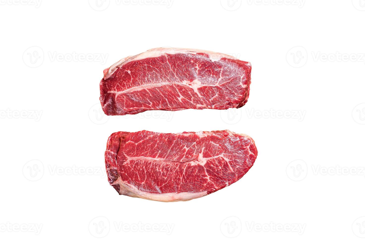 Raw Shoulder Top Blade beef meat steaks on a plate. Isolated on white background. photo