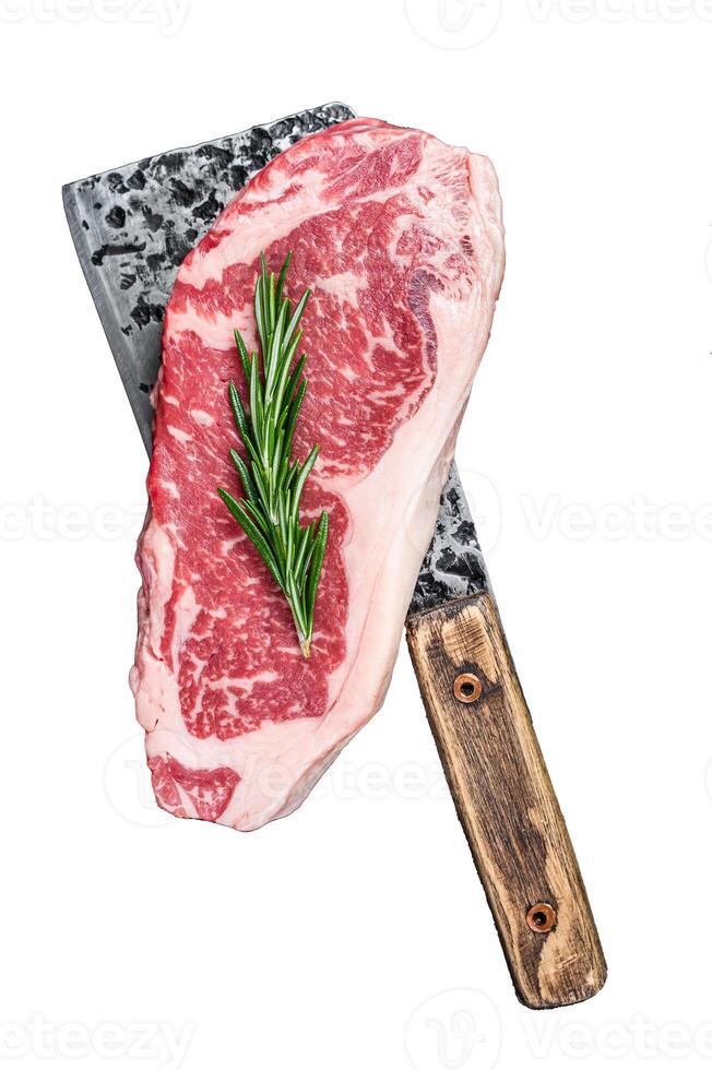 Fresh Raw striploin beef steak on a butcher meat cleaver. Isolated on white background, top view. photo