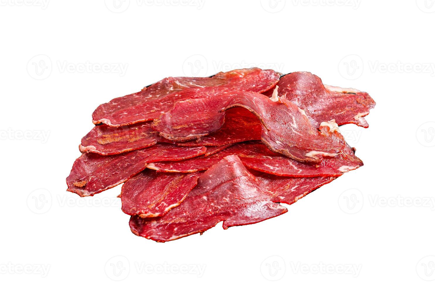 Dried sliced basturma, cured beef meat ready for eat. Isolated, white background. photo
