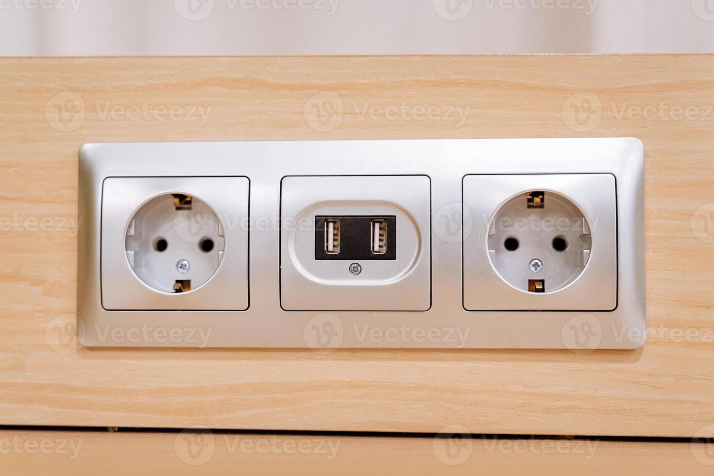 An electrical outlet with two sockets on it photo