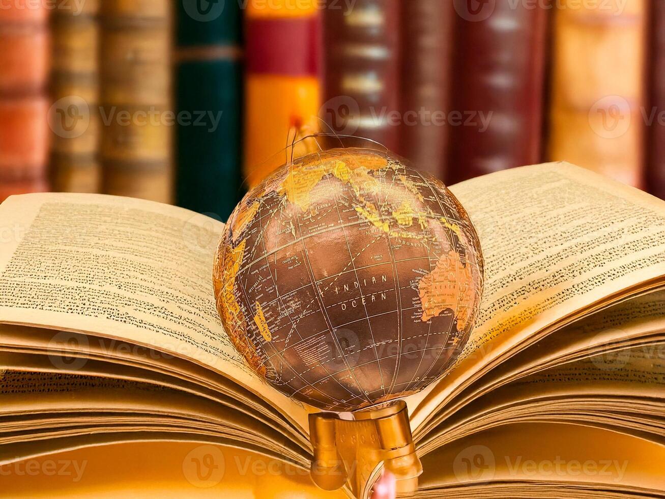 globes on the background of books.Conceptual training on the topics of education photo