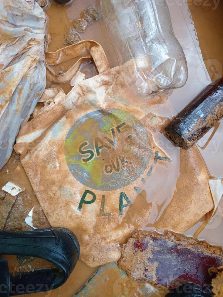Save the planet concept. Mud and other garbage caused danger storms. photo