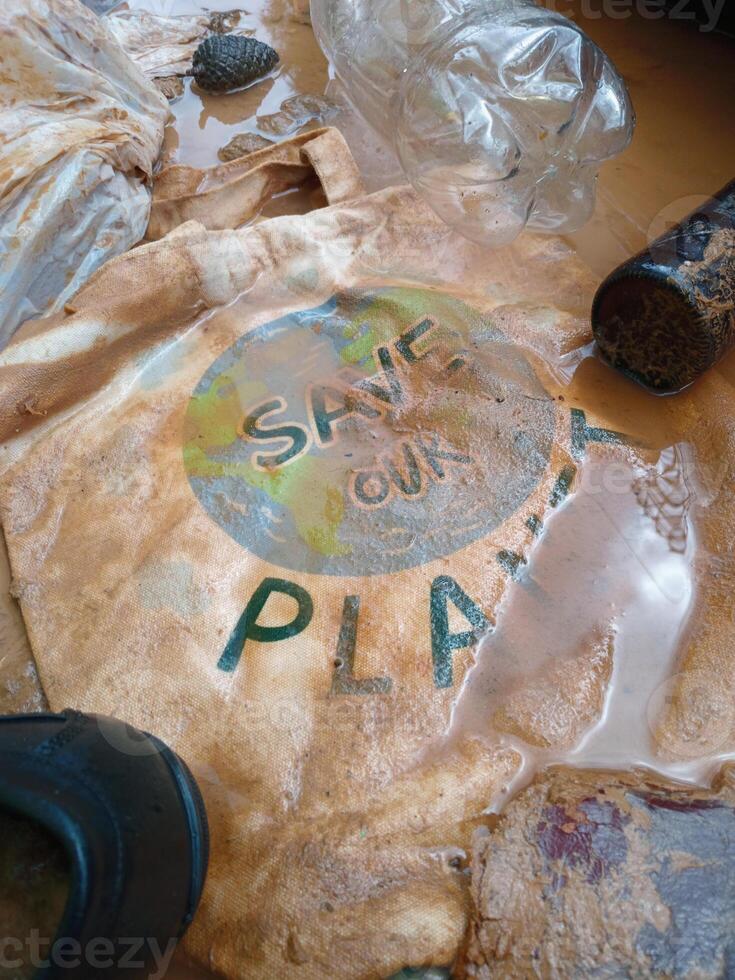 Save the planet concept. Mud and other garbage caused danger storms. photo