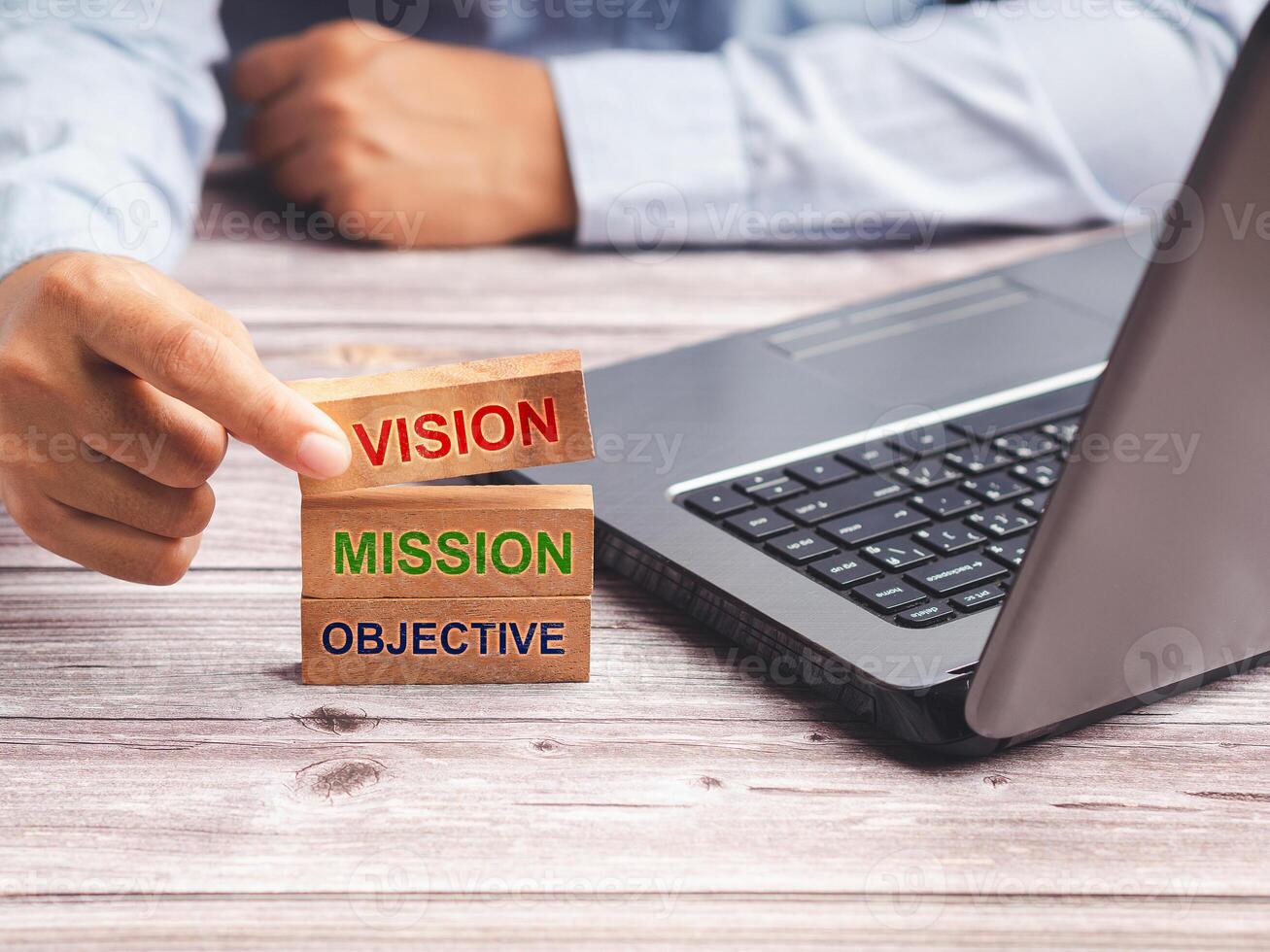 Vision, Mission, and objective on the wooden cubes. Business and strategy concept photo