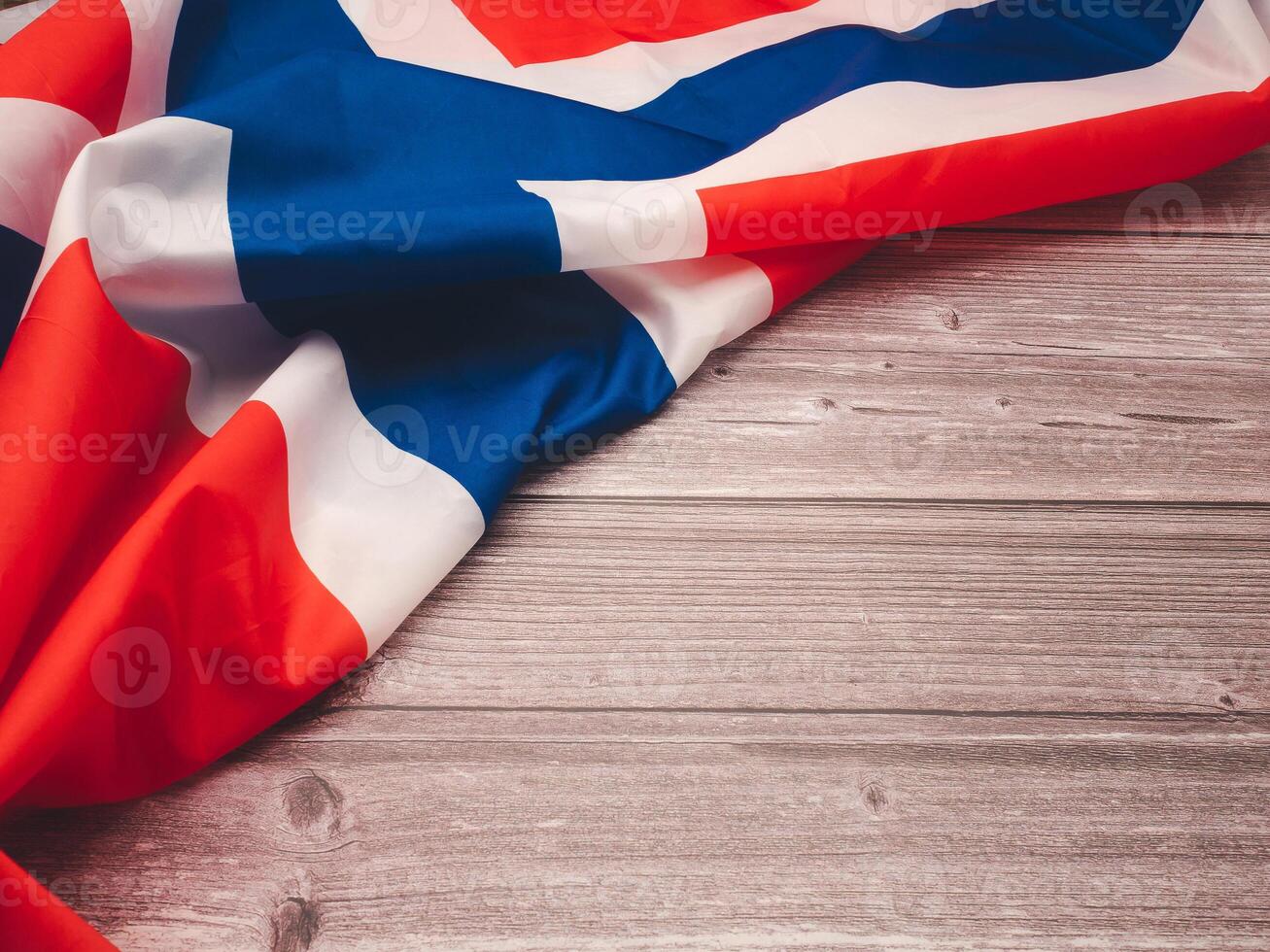 Top view of the Norway flag on a wooden table with copy space for text photo