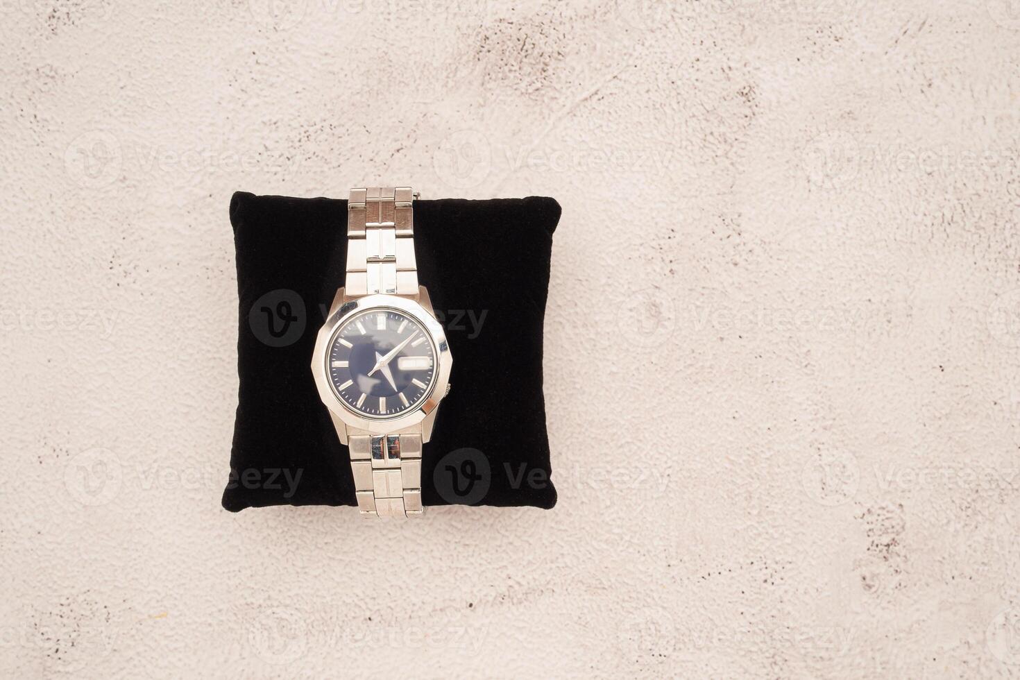 Happy Father's Day concept. A men's watch on black velvet over a table photo