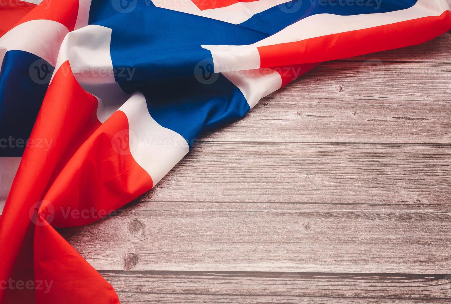 Top view of the Norway flag on a wooden table with copy space for text photo