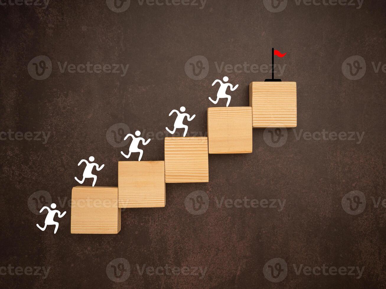 Common goal success concept. Teamwork rises to target and achieves a successful business photo