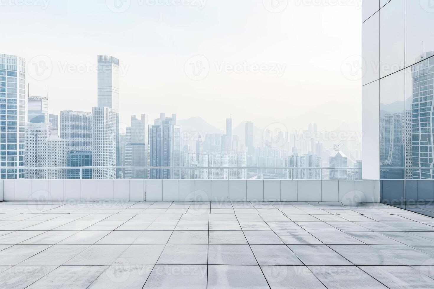 Modern Urban Skyline View from a Spacious Rooftop Terrace with Glass Railings and Concrete Flooring photo
