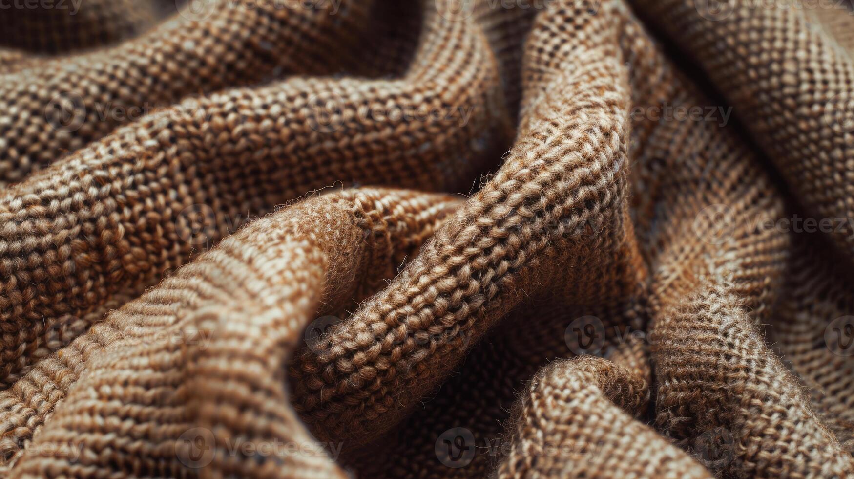 A piece of brown fabric with a lot of texture photo