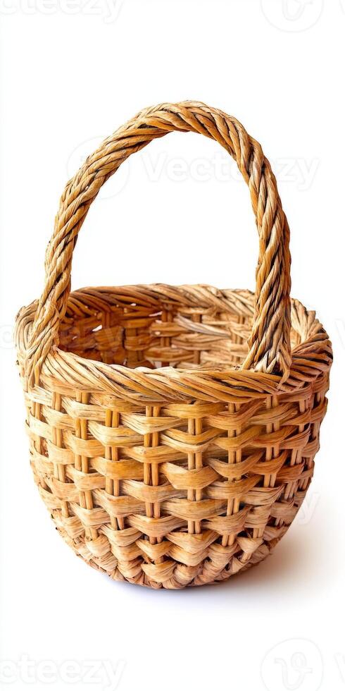 A basket with a handle is sitting on a white background photo