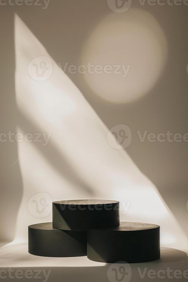 Minimalist Abstract Composition with Three Black Cylindrical Shapes photo