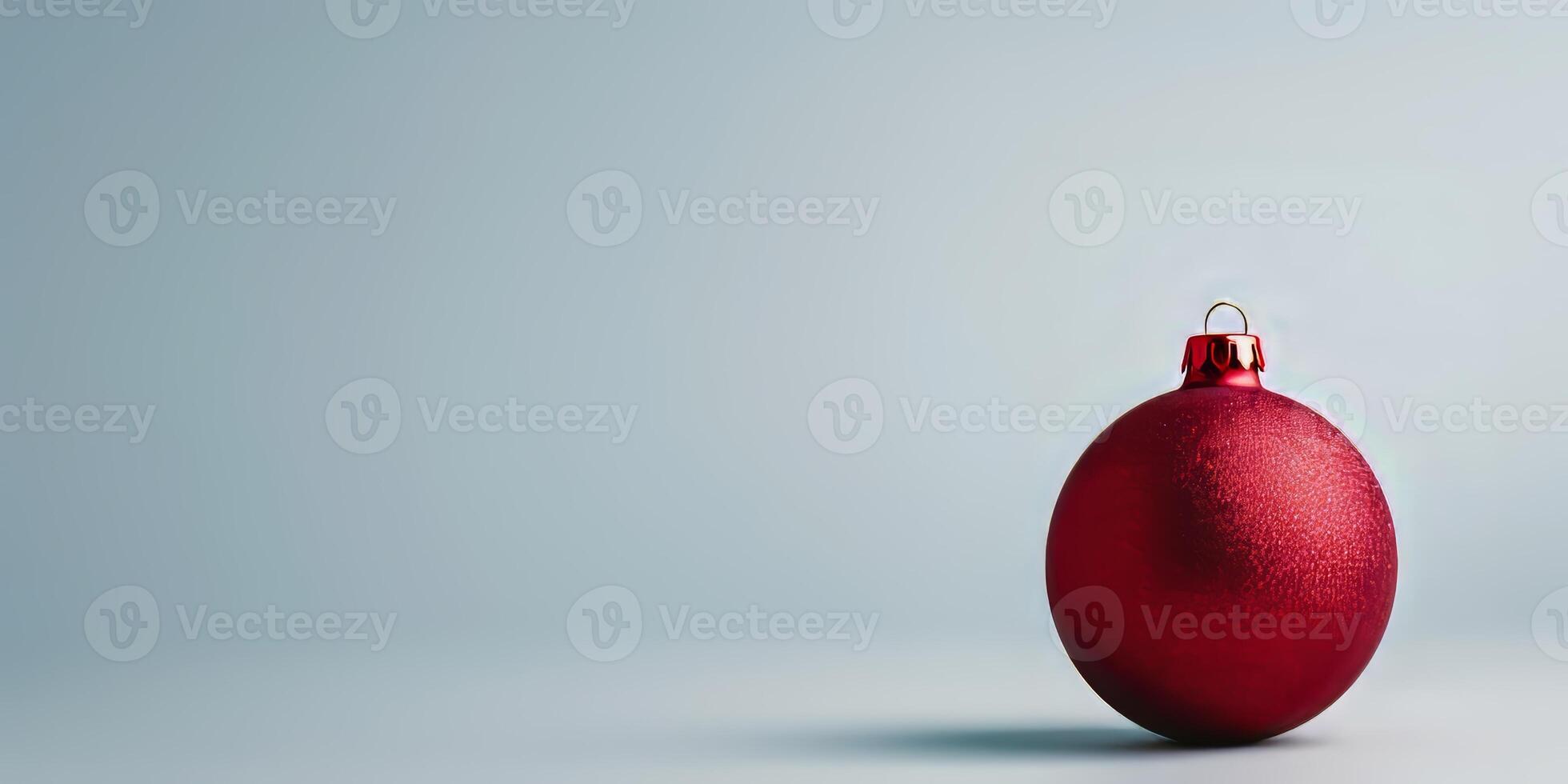 A red ball with a red ribbon on it photo