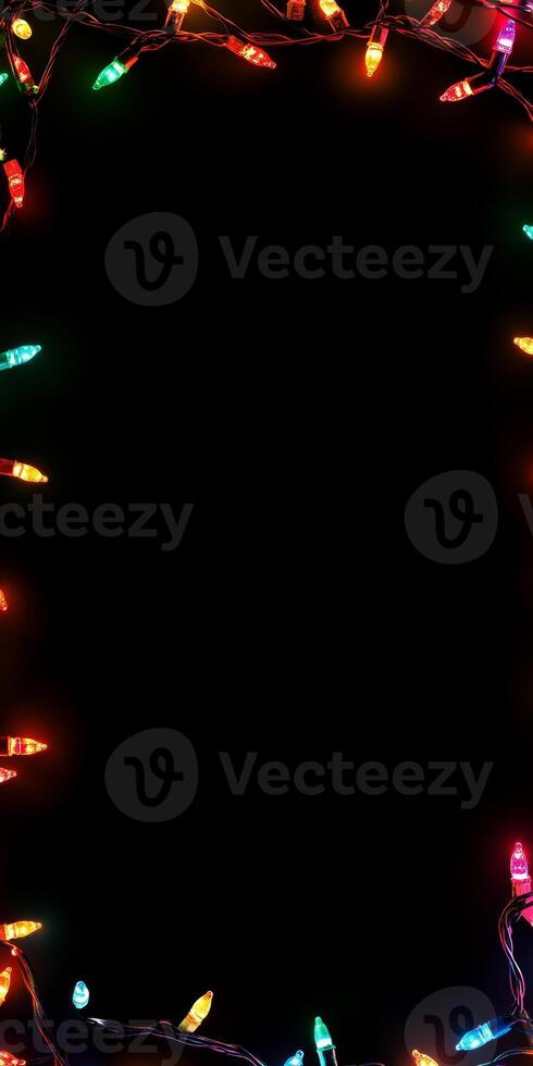 Vibrant Festive String Lights on Black Background Creating a Colorful Holiday Border with Copy Space photo