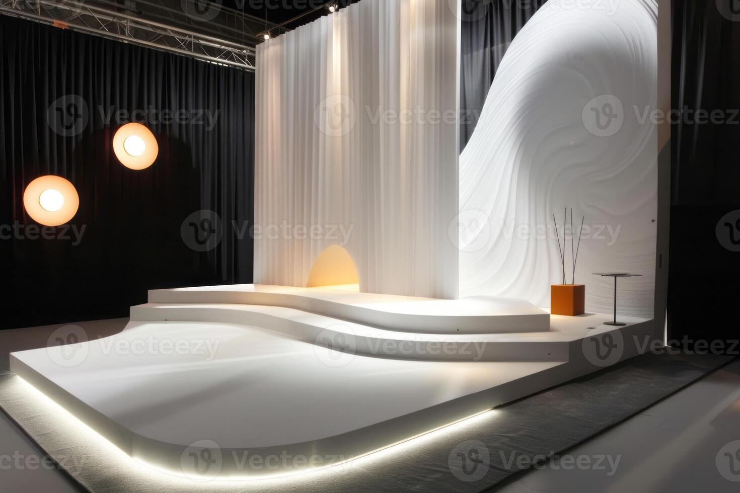Modern Minimalist Stage Design with Curved White Backdrop photo