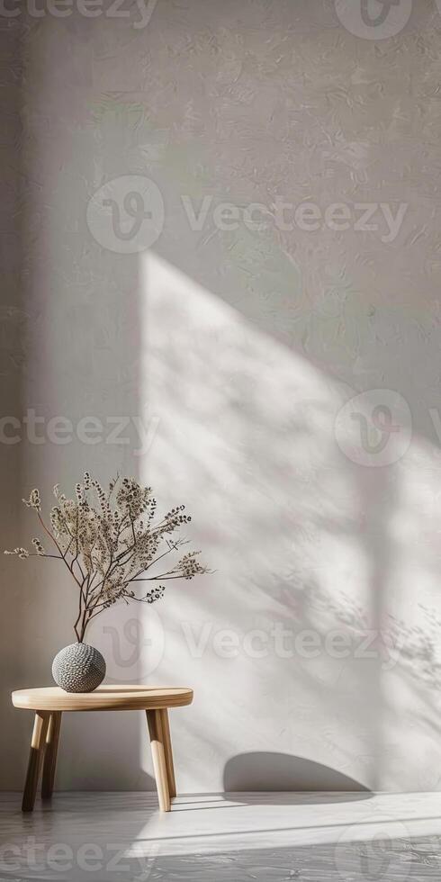 Clean and simple wall backdrop providing a minimalist setting for copy. photo