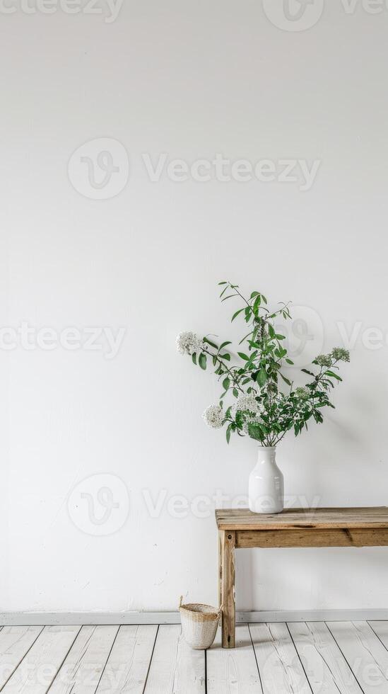 Minimalist Interior with Wooden Bench and White Vase photo