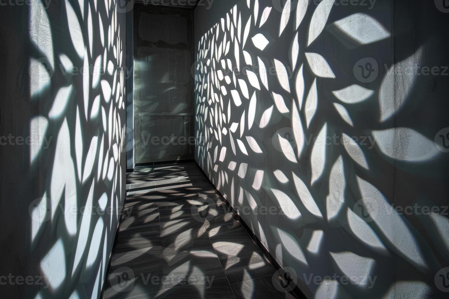Intricate Leaf Pattern Shadows Cast on Hallway Walls Creating a Mesmerizing Play of Light and Shadow photo
