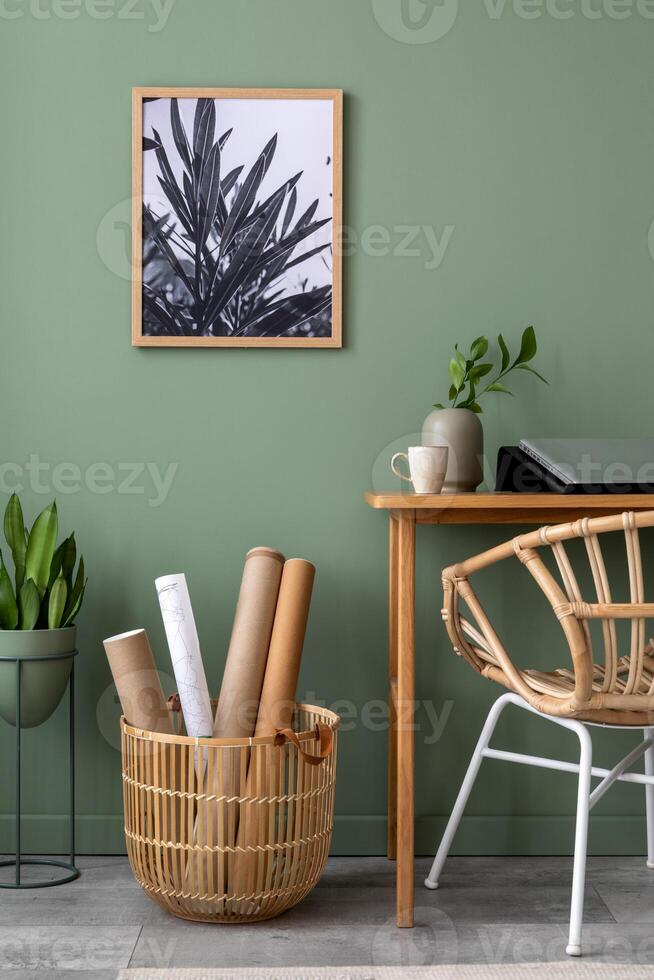Elegant details of modern interior design with basket, poster, plants and stylish personal accessories. Wooden vanity table. Mock up poster. Template. photo