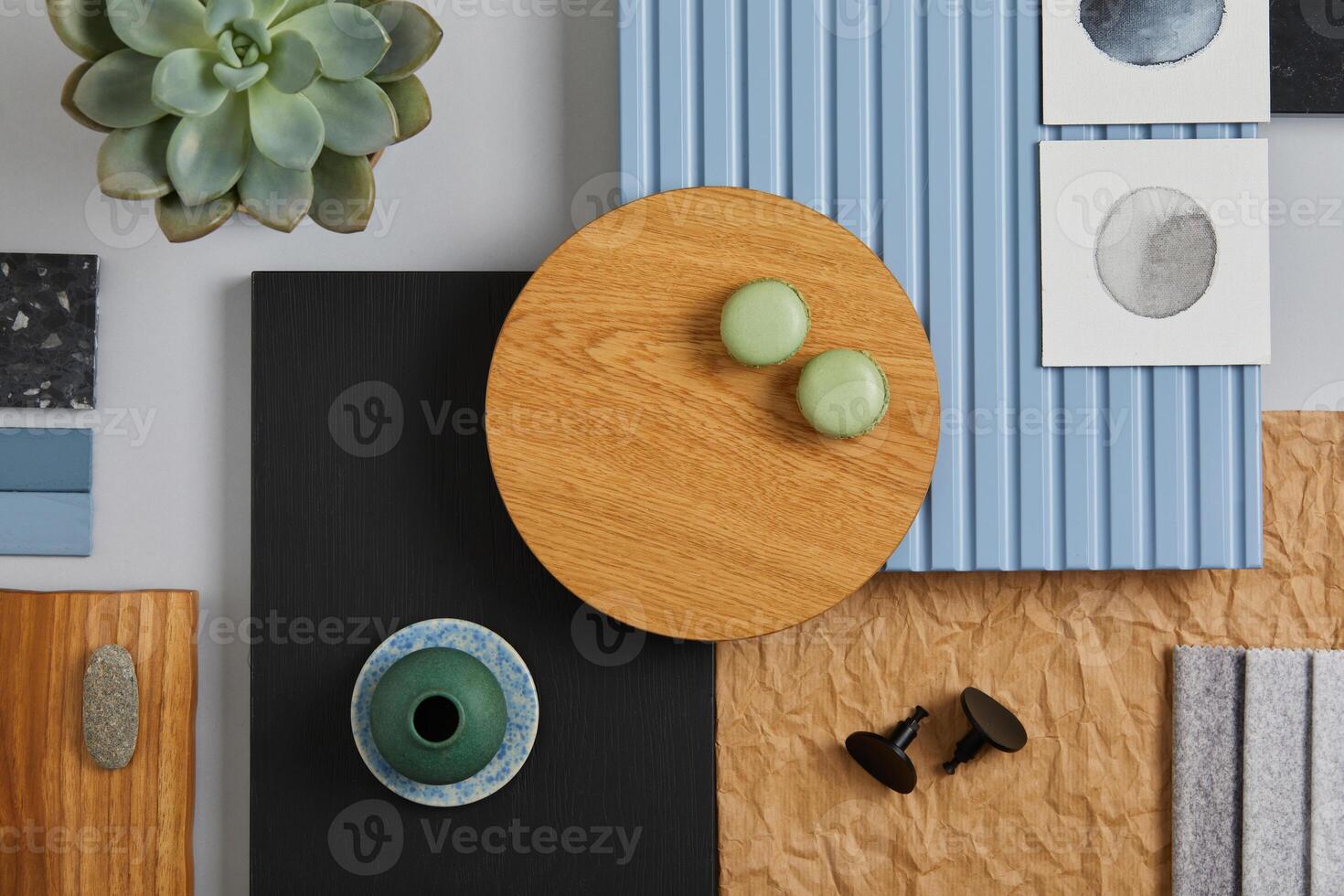 Flat lay of creative architect moodboard composition with samples of wood, textile, paint, lamella panels and tiles. Natural materials. Black, blue and light grey color palette. Copy space. Template. photo