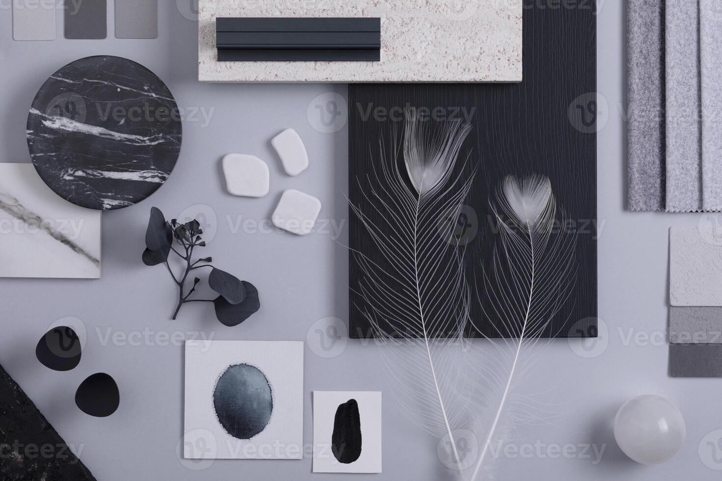 Creative flat lay composition in grey and black color palette with textile and paint samples, panels and tiles. Architect and interior designer moodboard. Top view. Copy space. Template. photo