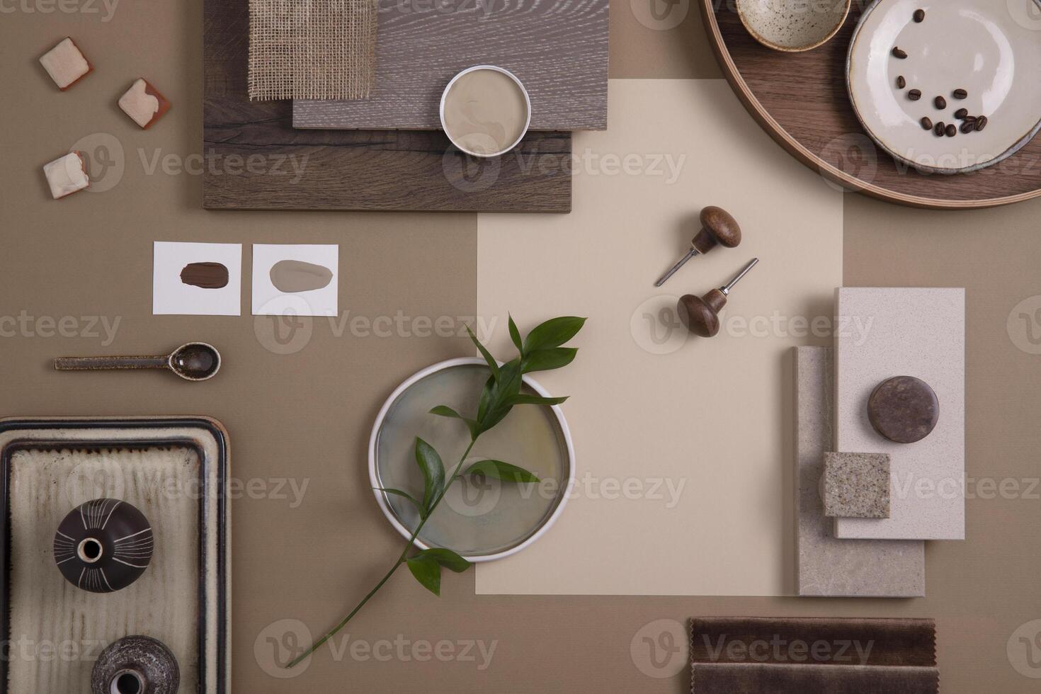 Flat lay of creative architect moodboard composition with samples of textile, paint, panels and tiles. Natural materials. Beige and brown color palette. Top view. Copy space. Template. photo