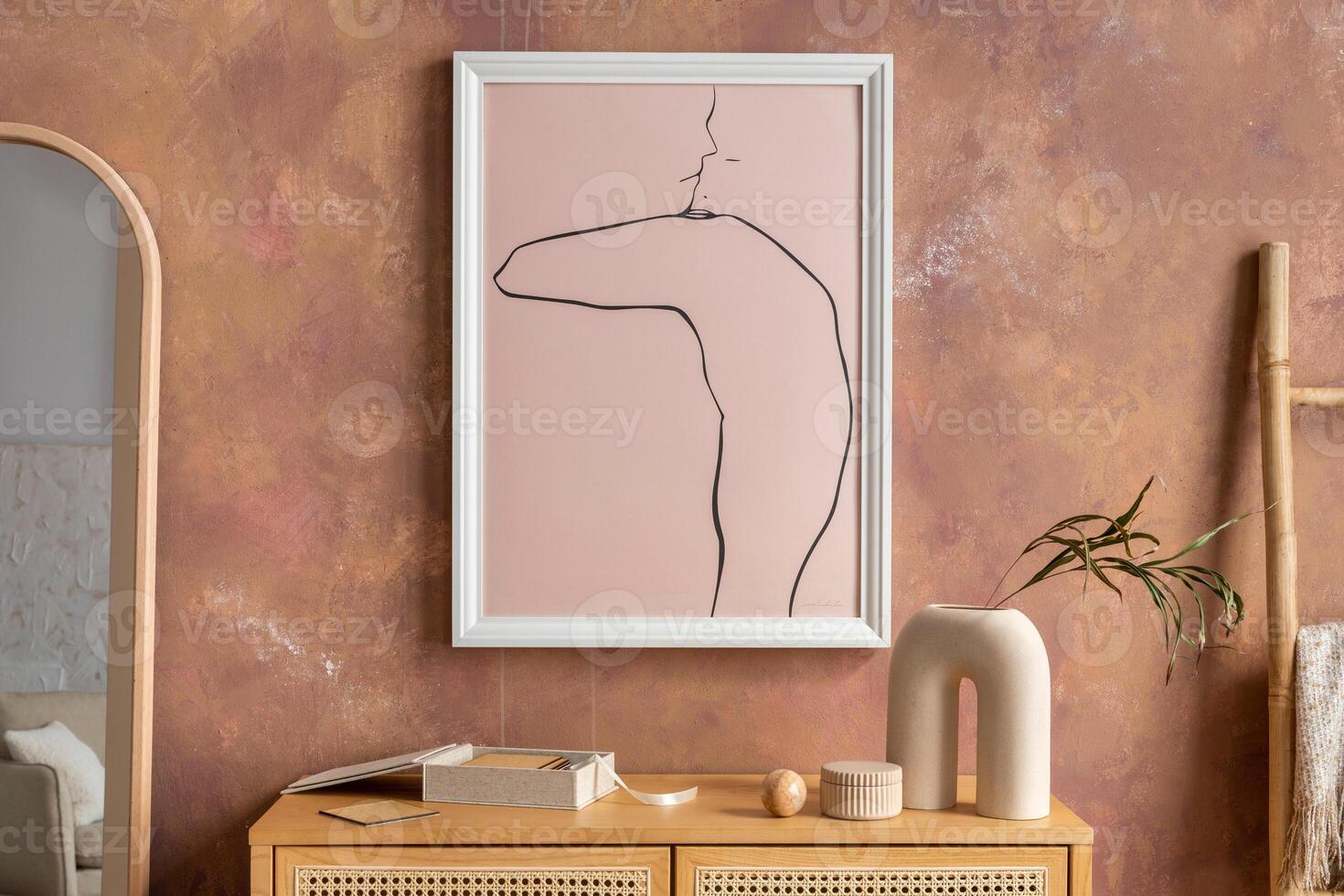Creative composition vintage living room with rattan chest of drawers, mirror and minimalistic poster. Mock up. photo