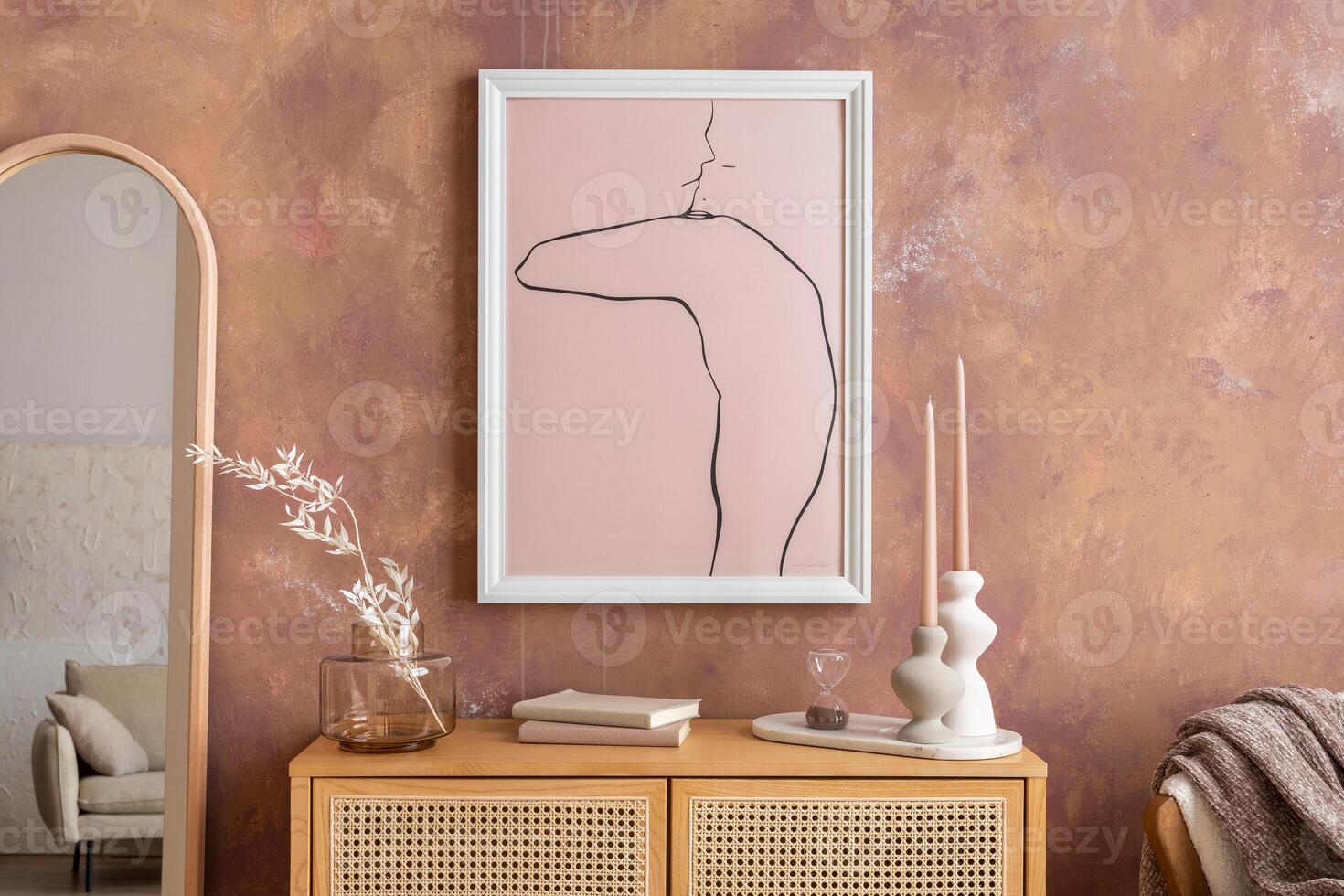 Creative composition vintage living room with rattan chest of drawers, mirror and minimalistic poster. Mock up. photo