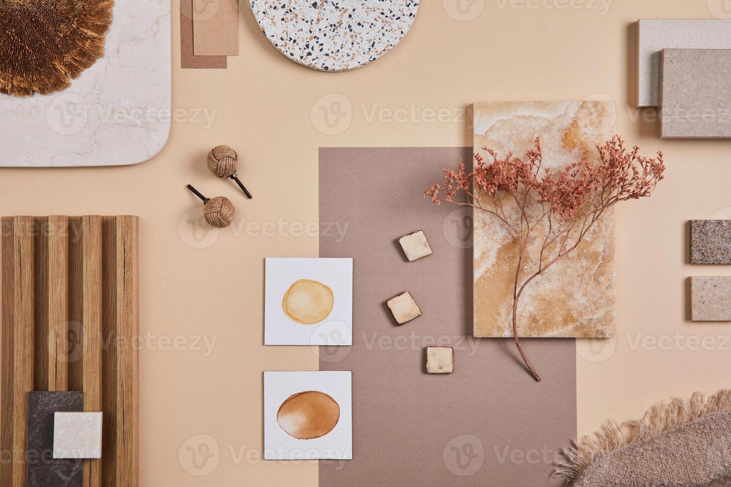 Flat lay of stylish architect moodboard composition with beige samples of textile, paint, wooden lamella panels and tiles. Top view. Copy space. Template. photo