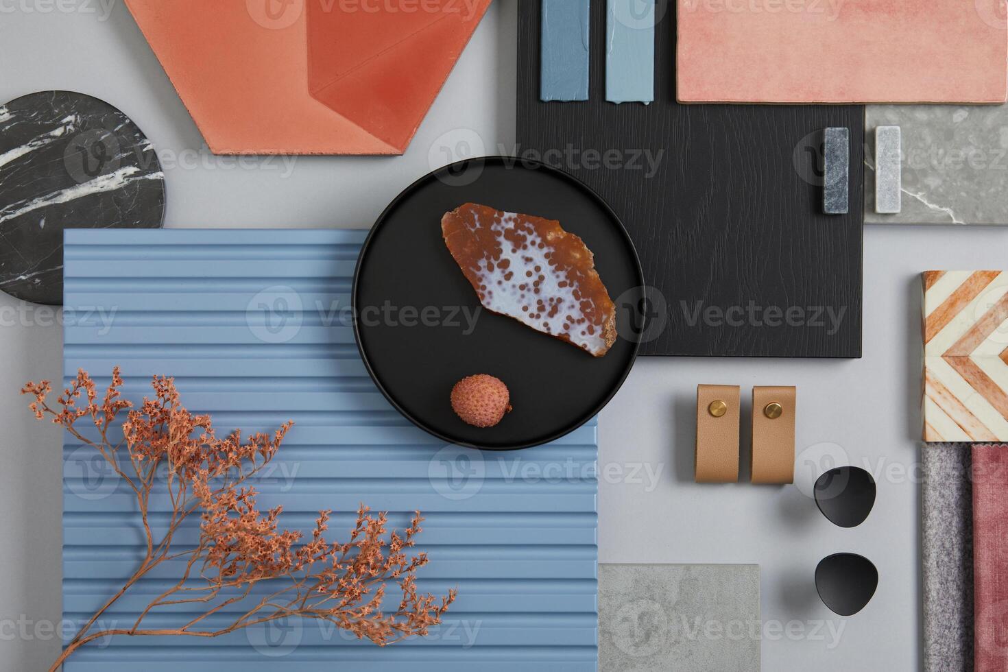 Creative flat lay composition of interior designer moodboard with textile and paint samples, blue lamella panels and tiles. Pink, black, blue and light grey color palette. Copy space. Template. photo