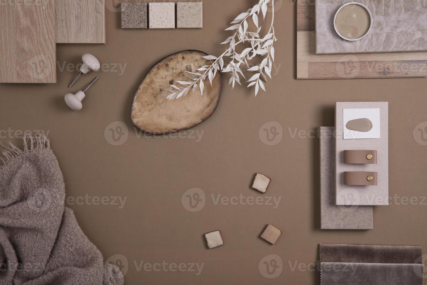 Flat lay of creative architect moodboard composition with samples of textile, paint, panels and tiles. Natural materials. Beige and brown color palette. Top view. Copy space. Template. photo