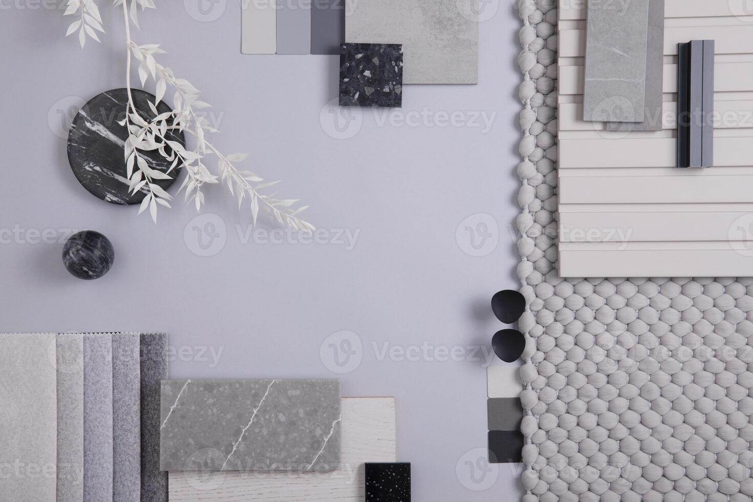 Elegant flat lay composition in grey color palette with textile and paint samples, lamella panels and tiles. Architect and interior designer moodboard. Top view. Copy space. photo